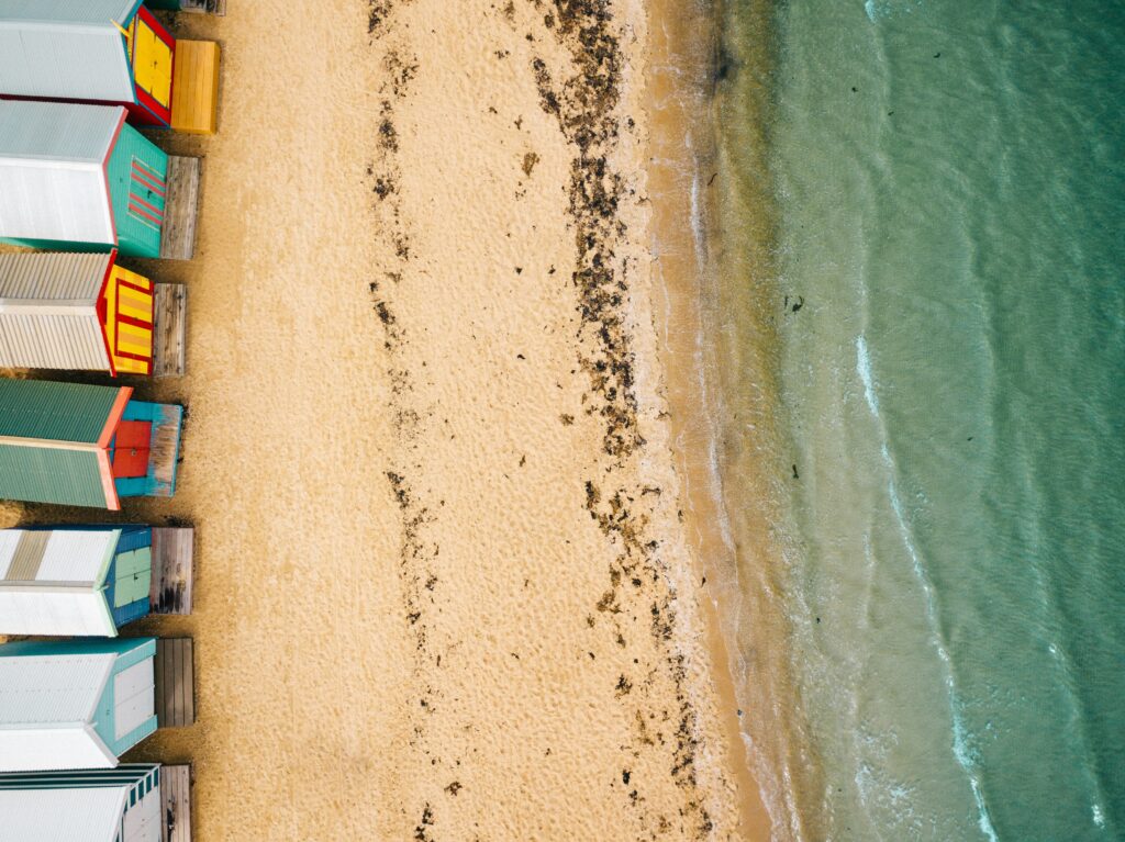 Aerial photograph of Brighton Beach and its bathing boxes in Melbourne